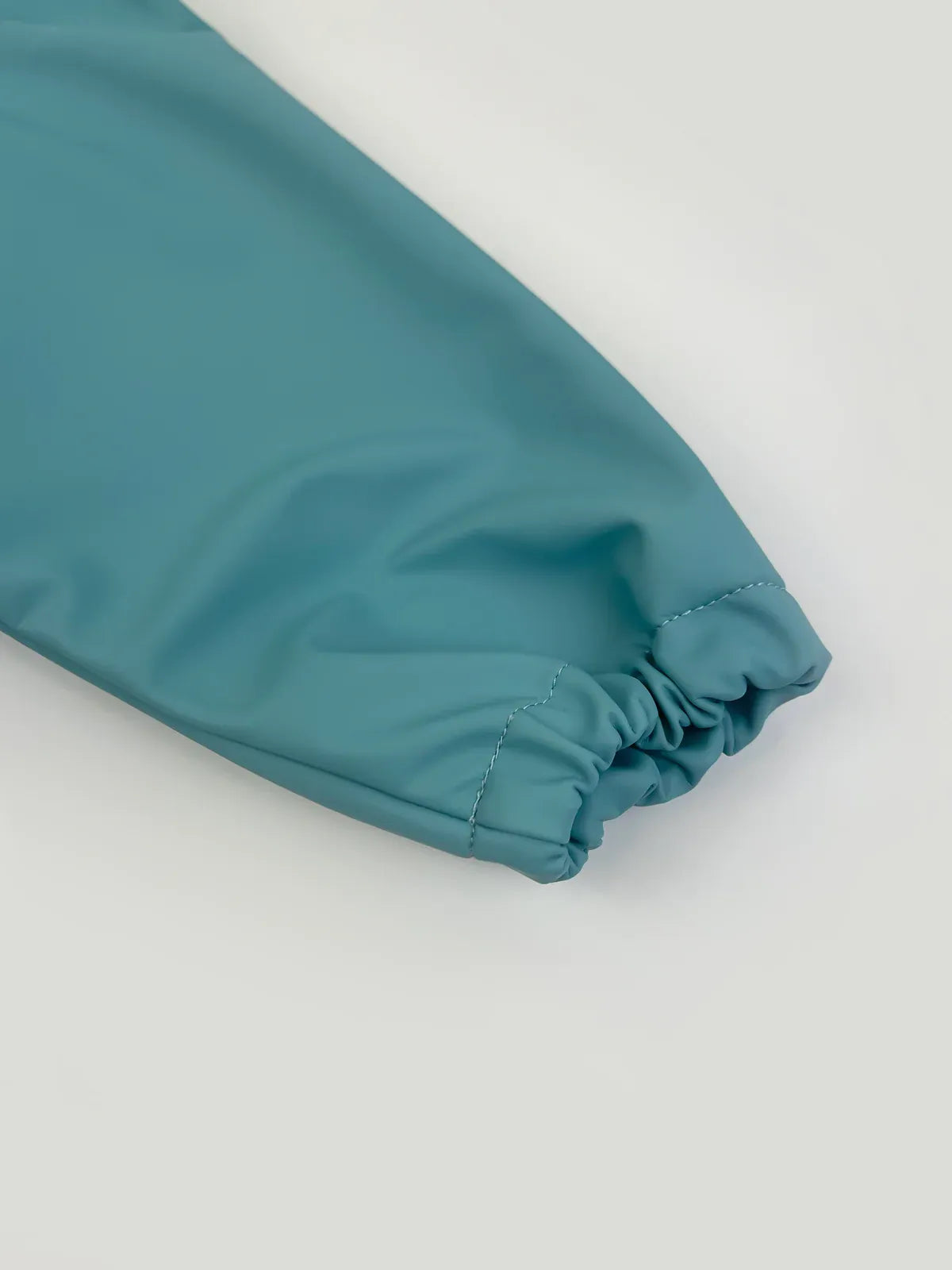 Waterproof Cape Sleeved Bib | Aqua Blue